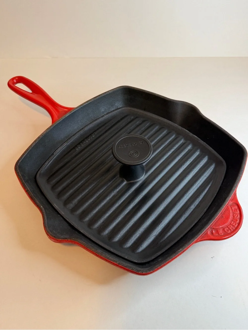 Le Creuset Red Cast Iron Square Grill Pan with Black Ridged Lid